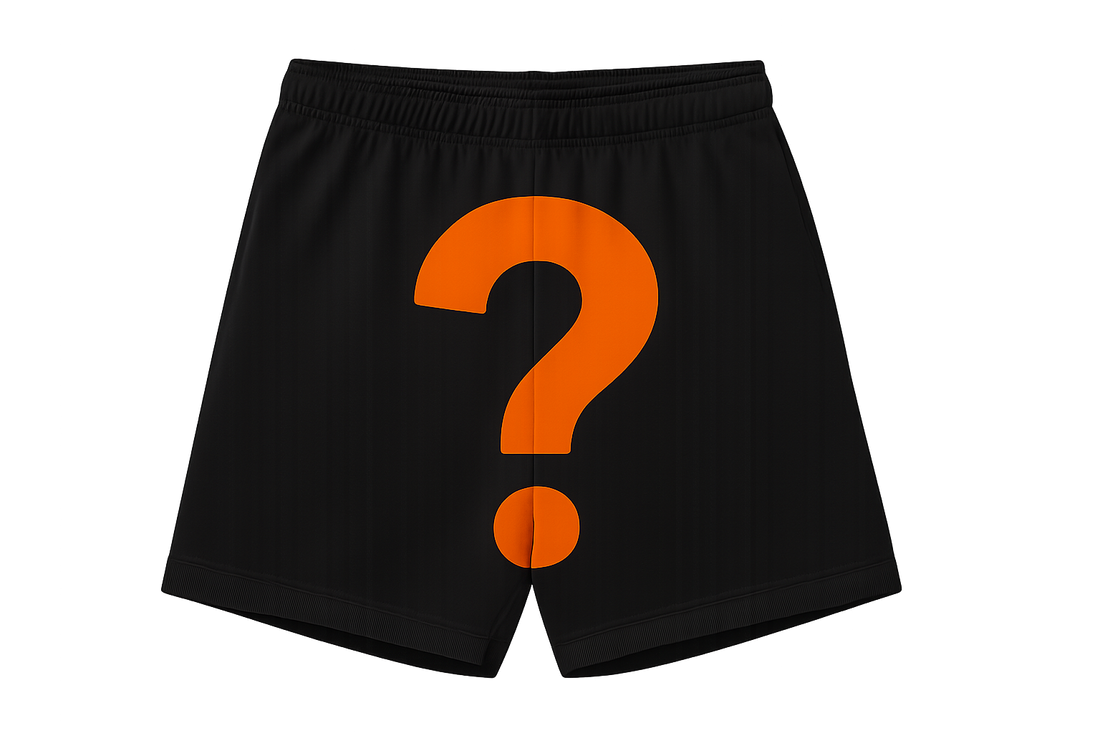 Black shorts with orange question mark on transparent background